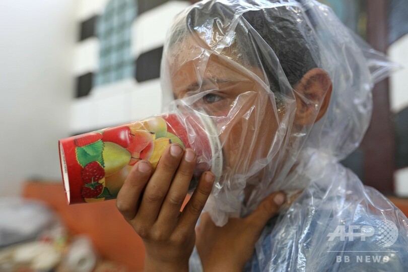 紙コップの手作りガスマスク 我が子を化学兵器から守るため 写真12枚 国際ニュース Afpbb News