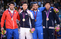 ロンドン五輪は1日、エクセル（ExCeL London）で柔道男子90キロ級3位決定戦が行われ、日本の西山将士（Masashi Nishiyama）はロシアのキリル・デニソフ（Kirill Denisov）を判定の末に退け、銅メダルを獲得した。

表彰式に臨む（左から）銀メダルのアスレイ・ゴンサレス（Asley Gonzalez）、金メダルの宋大男（Song Dae-Nam、ソン・デナム）、銅メダルのイリアス・イリアディス（Ilias Iliadis、左）と西山将士（Masashi Nishiyama、2012年8月1日撮影）。(c)AFP/FRANCK FIFE