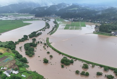 Thousands evacuated as record rains pound northern Japan