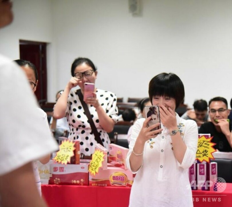 将来のパパたち 「妊娠の痛み」に挑戦 中国