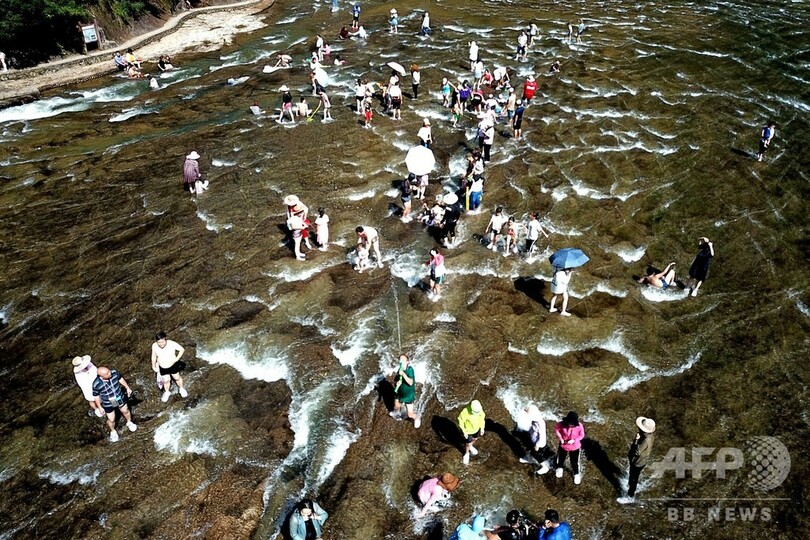 つかの間の涼を…天然の水上楽園「白水洋」 福建省