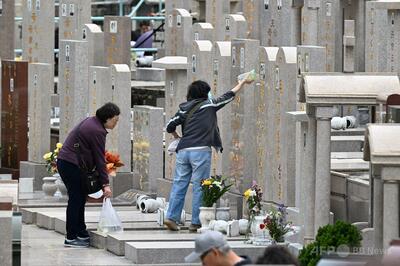 中国、集合住宅の「墓地利用」を禁止 葬儀代高騰で広まる「骨灰房」