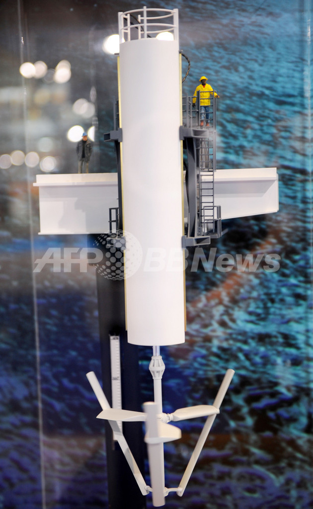 温暖化対策会議、会場入り口でデモ 環境展示会も