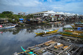 パラニャーケのごみ処分場近くを流れる川。フィリピンの首都マニラで（2023年12月27日）。(c)JAM STA ROSA / AFP