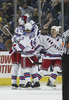 写真は、得点を決め喜ぶレンジャーズ選手達。(c)AFP/Getty Images Rick Stewart