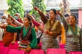 インドの首都ニューデリーで、ダライ・ラマ14世の87歳の誕生日を祝う亡命チベット人（2022年7月6日撮影）。(c)Prakash SINGH / AFP