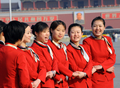 2008年3月5日、北京（Beijing）の天安門広場（Tiananmen Square）でポーズを取る、全国人民代表大会で接客係を務める女性たち。(c)AFP/GOH CHAI HIN