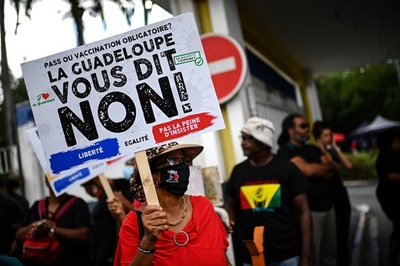 フランス、2022年初にはオミクロン株主流に 首相が見解