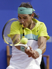 男子テニス、バルセロナ・オープン・バンコ・サバデル（%%Barcelona Open Banco Sabadell 2009%%）シングルス決勝。大会第1シードのラファエル・ナダル（%%Rafael Nadal%%、スペイン）は、大会第4シードのダビド・フェレール（%%David Ferrer%%、スペイン）と対戦。ナダルはセットカウント2-0（6-2、7-5）のストレートで勝利し、大会5連覇を達成した。写真はリターンショットを放つラファエル・ナダル。（2009年4月26日撮影）(c)AFP/JOSEP LAGO