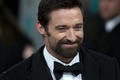 英国アカデミー賞（British Academy Film Awards）授賞式に出席した俳優ヒュー・ジャックマン（Hugh Jackman、2013年2月10日撮影）。(c)AFP/ANDREW COWIE