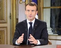 フランス首都パリにある大統領府でテレビ演説を行うエマニュエル・マクロン大統領（2018年12月10日撮影）。(c)LUDOVIC MARIN / POOL / AFP