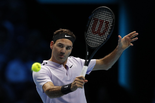 ATPファイナル開幕、V7目指すフェデラーが白星発進 写真10枚