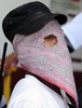 メキシコ西部ミチョアカン（Michoacan）州のヌエバ・イタリア（Nueva Italia）で撮影された自警団のメンバー（2014年1月12日撮影）。(c)AFP/ALFREDO ESTRELLA