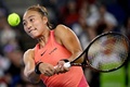 女子テニス、武漢オープン、シングルス準々決勝。リターンを打つ鄭欽文（2024年10月11日撮影）。(c)WANG Zhao / AFP