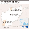 アフガニスタンの旧支配勢力タリバンが制圧した二つの州都、シェベルガンとザランジの位置を示した図。(c)AFP