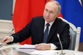 ロシア首都モスクワの大統領府で、中国の習近平国家主席とオンラインで会談するウラジーミル・プーチン大統領（2022年12月30日撮影）。(c)Mikhail Klimentyev / SPUTNIK / AFP