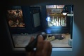 米首都ワシントンのレンリックギャラリーで展示されたフランシス・グレスナー・リーが製作した殺人現場のジオラマ（2018年1月23日撮影）。(c)AFP PHOTO / MANDEL NGAN