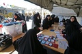 イラン・テヘラン郊外で、国会選挙で票を投じる人々（2020年2月21日撮影）。(c)ATTA KENARE / AFP