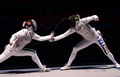 ロンドン五輪は28日、エクセル（ExCeL London）でフェンシングの女子フルーレ個人決勝が行われ、イタリアのエリーザ・ディフランチェスカ（Elisa Di Francisca）が12-11でイタリアのアリアンナ・エッリゴ（Arianna Errigo）に勝利し、金メダルを獲得した。

決勝で対戦するアリアンナ・エッリゴ（左）とエリーザ・ディフランチェスカ（2012年7月28日撮影）。(c)AFP/TOSHIFUMI KITAMURA