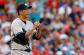 13MLB、ボストン・レッドソックス（Boston Red Sox）対ニューヨーク・ヤンキース（New York Yankees）。先発登板するニューヨーク・ヤンキースの黒田博樹（Hiroki Kuroda、2013年7月20日撮影）。(c)AFP/Getty Images/Jared Wickerham