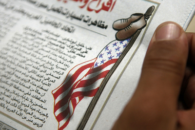 米大統領に靴投げたイラク人記者、拘束時に数か所を骨折