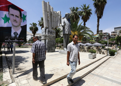 シリア大統領派の選挙集会に砲撃、21人死亡