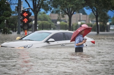 中国中部豪雨、約20万人避難