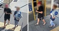 オーストラリア・クイーンズランド州ブリスベン近郊の駅で、野生のカモノハシを連れて歩く男。同州警察提供（2023年4月6日公開）。(c)AFP PHOTO / QUEENSLAND POLICE SERVICE