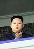 韓国のテレビ局が放映した北朝鮮・平壌（Pyongyang）の金日成広場で、朝鮮労働党創建65周年を記念して開かれた軍事パレードを観覧する金正日（キム・ジョンイル、Kim Jong-Il）総書記の三男、金正恩（キム・ジョンウン、Kim Jong-Un）氏（2010年10月10日朝鮮中央通信配信）。(c)AFP/KCTV via South Korean TV