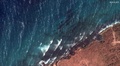 トリニダード・トバゴ沖で見つかった転覆したはしけから流出した油の様子を捉えた衛星画像。米宇宙技術会社マクサー・テクノロジーズ提供（2024年2月14日撮影、提供）。(c)AFP PHOTO / Satellite image ©︎2024 Maxar Technologies