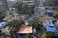 エジプト首都カイロ（Cairo）のラバ・アルアダウィヤ（Rabaa al-Adawiya）モスク近くにある、座り込みデモの強制排除が行われた広場（2013年8月15日撮影）。(c)AFP/MAHMOUD KHALED
