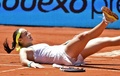 テニス、マドリード・オープン、女子シングルス3回戦。試合中に転倒するキャロリン・ガルシア（2015年5月6日撮影）。(c)AFP/GERARD JULIEN