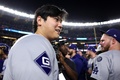 24MLB、ワールドシリーズ（7回戦制）、ニューヨーク・ヤンキース対ロサンゼルス・ドジャース。優勝を喜ぶロサンゼルス・ドジャースの大谷翔平（2024年10月30日撮影）。(c)Elsa/Getty Images/AFP