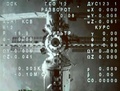 モニターに映し出された、前澤友作氏らを乗せたロシアの宇宙船「ソユーズ」が分離された後の国際宇宙ステーション（ISS）（2021年12月20日撮影）。(c)Alexander NEMENOV / AFP