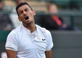 テニス、ウィンブルドン選手権、男子シングルス3回戦。不満そうな表情を浮かべるニック・キリオス（2016年7月3日撮影）。(c)AFP/GLYN KIRK