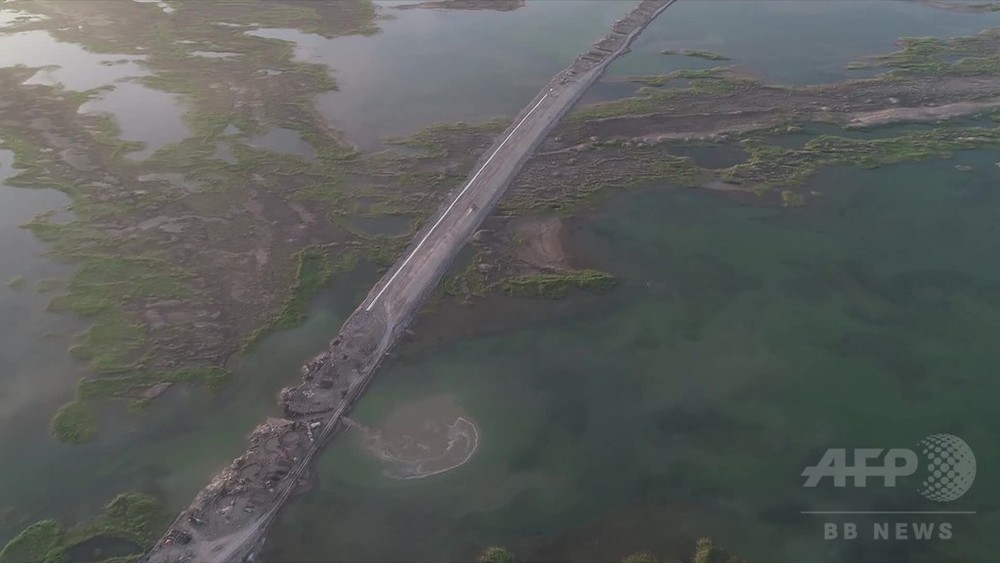 動画:中国西部タイテマ湖を縦断する道路 かさ上げで湖面上昇に対応 写真1枚 国際ニュース:AFPBB News