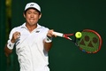 テニス、ウィンブルドン選手権、男子シングルス1回戦。リターンを打つ西岡良仁（2023年7月3日撮影）。(c)SEBASTIEN BOZON / AFP