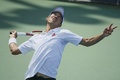 テニス、全米オープン（The US Open Tennis Championships 2014）男子シングルス1回戦。サーブを打つ錦織圭（Kei Nishikori、2014年8月26日撮影）。(c)AFP/Kena Betancur