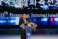 北朝鮮の首都・平壌で開かれた第15回平壌国際映画祭の開会を宣言する朴春男（パク・チュンナム）文化相（2016年9月16日撮影）。(c)AFP/Kim Won-Jin