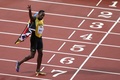第16回世界陸上ロンドン大会、男子100メートル決勝。レース後、歓声に応えるウサイン・ボルト（2017年8月5日撮影）。(c)AFP/Daniel LEAL-OLIVAS