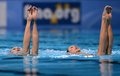 第15回世界水泳選手権（15th FINA World Championships）は21日、スペイン・バルセロナ（Barcelona）でシンクロナイズドスイミングのデュエット・テクニカルルーティン（TR）が行われ、ロシアのスベトラナ・ロマシナ（Svetlana Romashina）／スベトラナ・コレスニチェンコ（Svetlana Kolesnichenko）組が優勝した。

デュエットTR決勝の演技に臨む中国の蔣 婷婷（Jiang Tingting）／蔣 文文（Jiang Wenwen）組（2013年7月21日撮影）。(c)AFP/JAVIER SORIANO