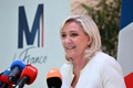 仏パリで記者会見したフランスの極右政党「国民連合（RN）」のマリーヌ・ルペン党首（2022年4月13日撮影）。(c)Emmanuel DUNAND / AFP