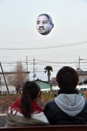 宇都宮に浮かぶおじさんの顔