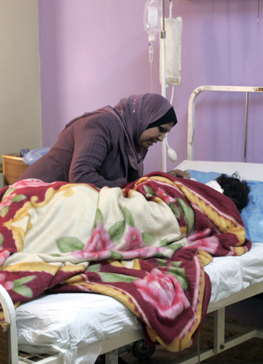 国営テレビの女性キャスター、銃撃される - イラク