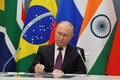 BRICS首脳会議（サミット）にオンラインで出席するロシアのウラジーミル・プーチン大統領。南アフリカ・ヨハネスブルクで（2023年8月24日撮影）。(c)Mikhail KLIMENTYEV / POOL / AFP