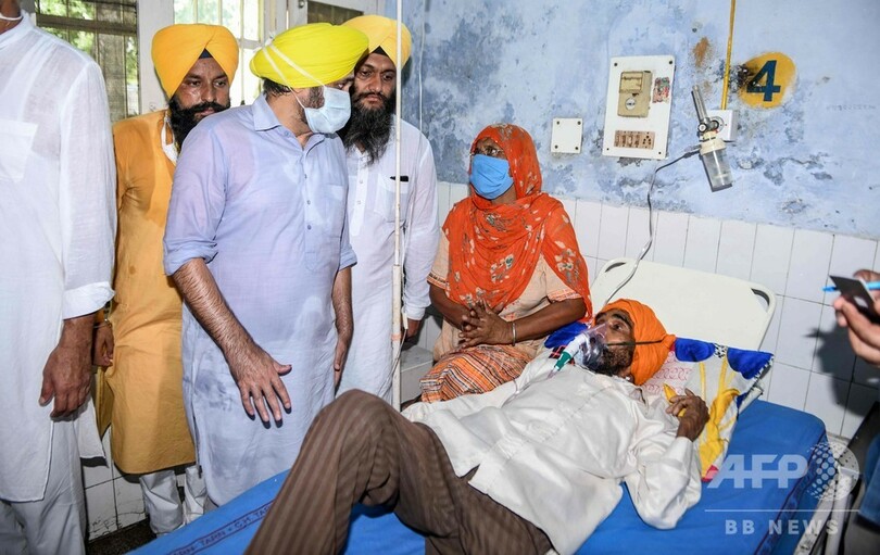 インドの密造酒による死者、98人に