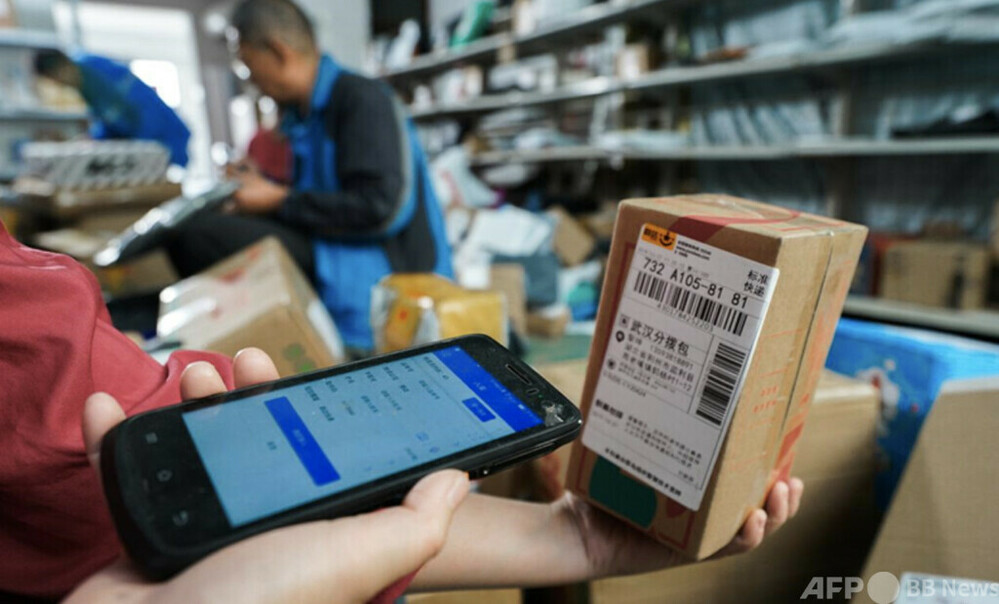 中国、最大規模の郵便配達ネットワークを構築 写真1枚 国際ニュース:AFPBB News 中国、最大規模の郵便配達ネットワークを構築 写真1枚 国際ニュース:AFPBB News