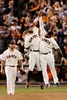 14MLBワールドシリーズ（7回戦制）第5戦、サンフランシスコ・ジャイアンツ（San Francisco Giants）対カンザスシティ・ロイヤルズ（Kansas City Royals）。試合に勝利し喜び合うサンフランシスコ・ジャイアンツのブランドン・ベルト（Brandon Belt、左）とパブロ・サンドバル（Pablo Sandoval、2014年10月26日撮影）。(c)AFP/Getty Images/Thearon W. Henderson