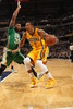 14-15NBA、インディアナ・ペイサーズ対ボストン・セルティックス。ドライブを仕掛けるインディアナ・ペイサーズのジョージ・ヒル（2015年3月14日撮影）。(c)AFP/Getty Images/NBAE/Ron Hoskins