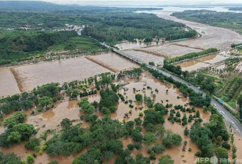 北京で豪雨発生 30人死亡